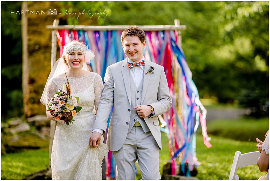 DIY wedding ceremony arbor backdrop photographer