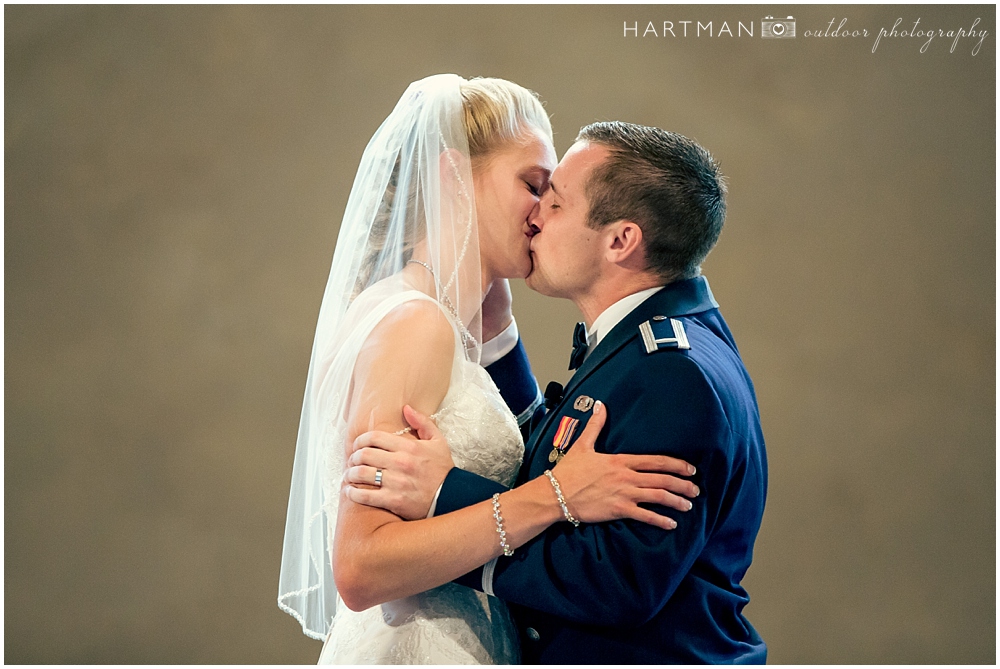 Bride and Groom kiss blanchard road alliance church