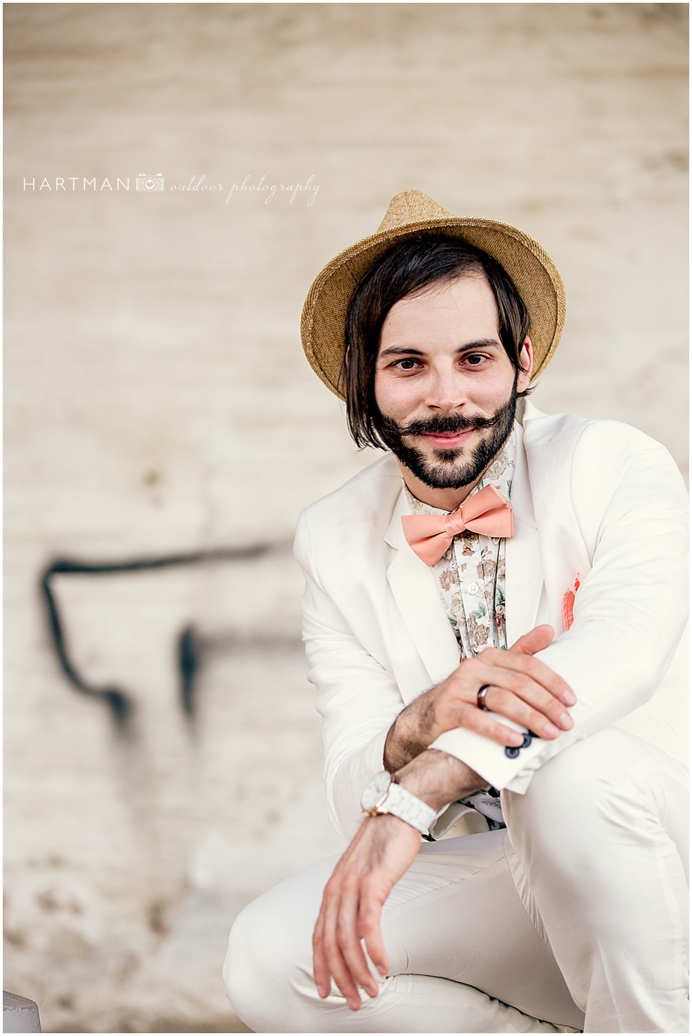 Groom with Hat and Pink Bowtie