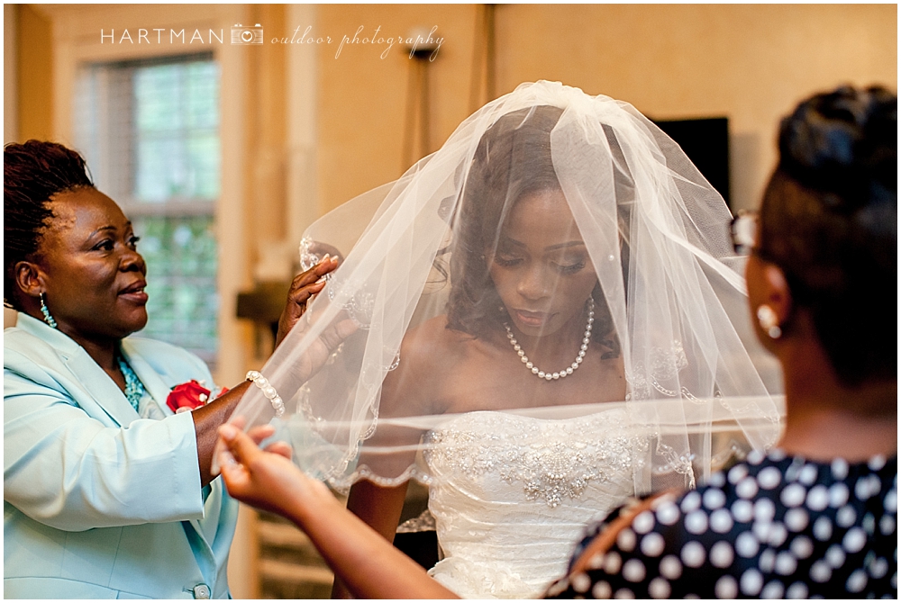 Black bride with veil and mother