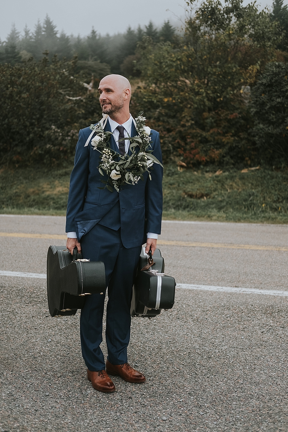 groom playing guitar